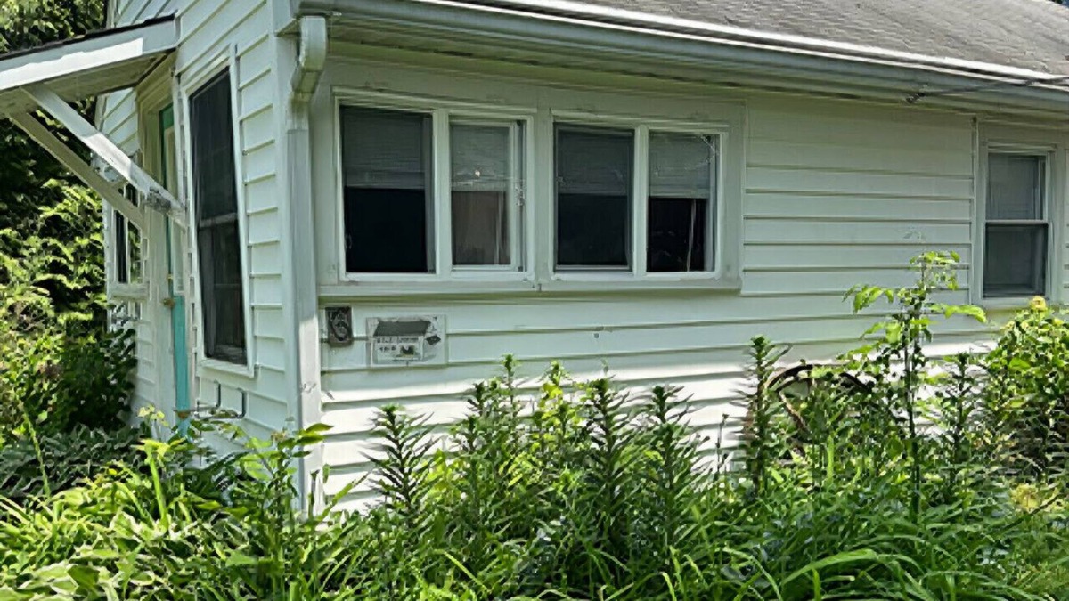 St. Michaels Cottage | Cottage #6 Wild Goose on the left of Main House