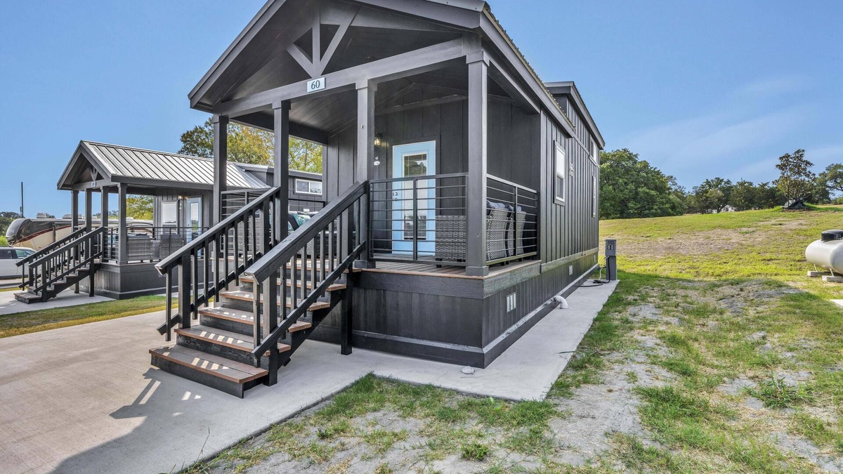 Brenham Cottage | Cottage with Loft - Includes 3 queen beds (one in master and 2 in loft), a fully equipped kitchen, dining area, private bath and shower, TVs, Wifi, all utilities, access to all resort amenities. Pets are not permitted in this cottage.
