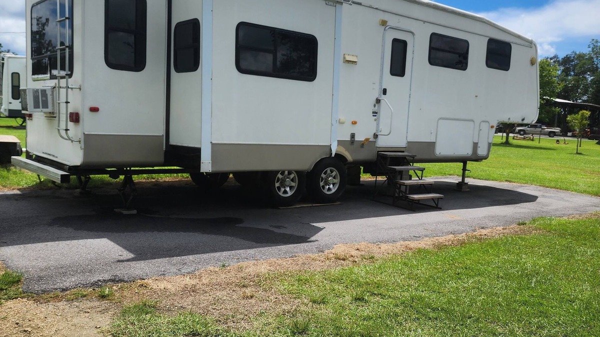 Cottondale RV Rental | Cougar RV in beautiful camp ground.