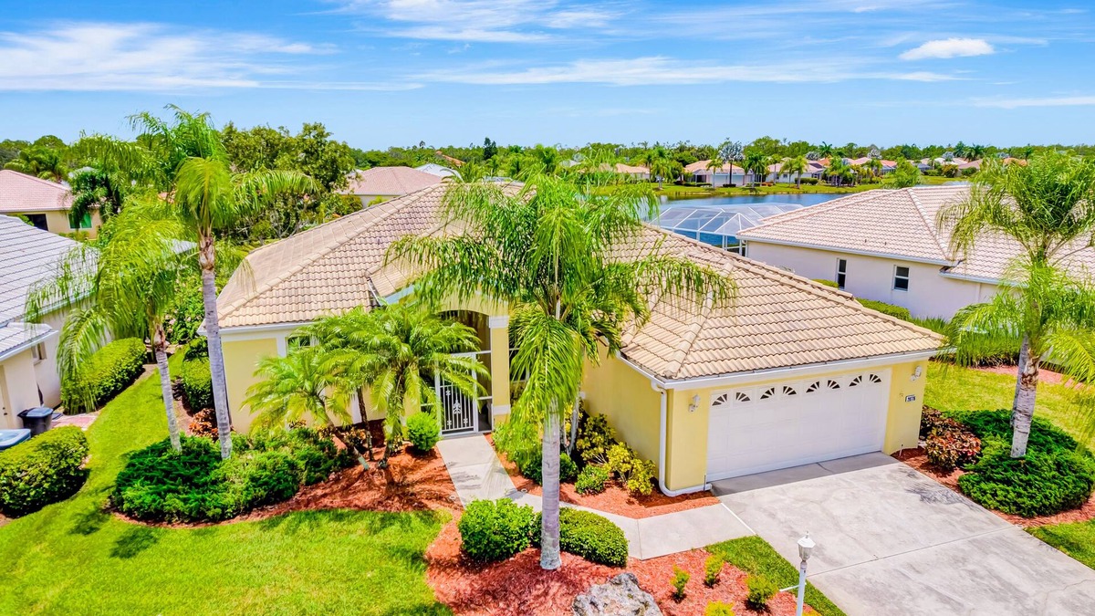 Herons Glen House | Country club retreat with private pool, water views, on-site golf, & gym