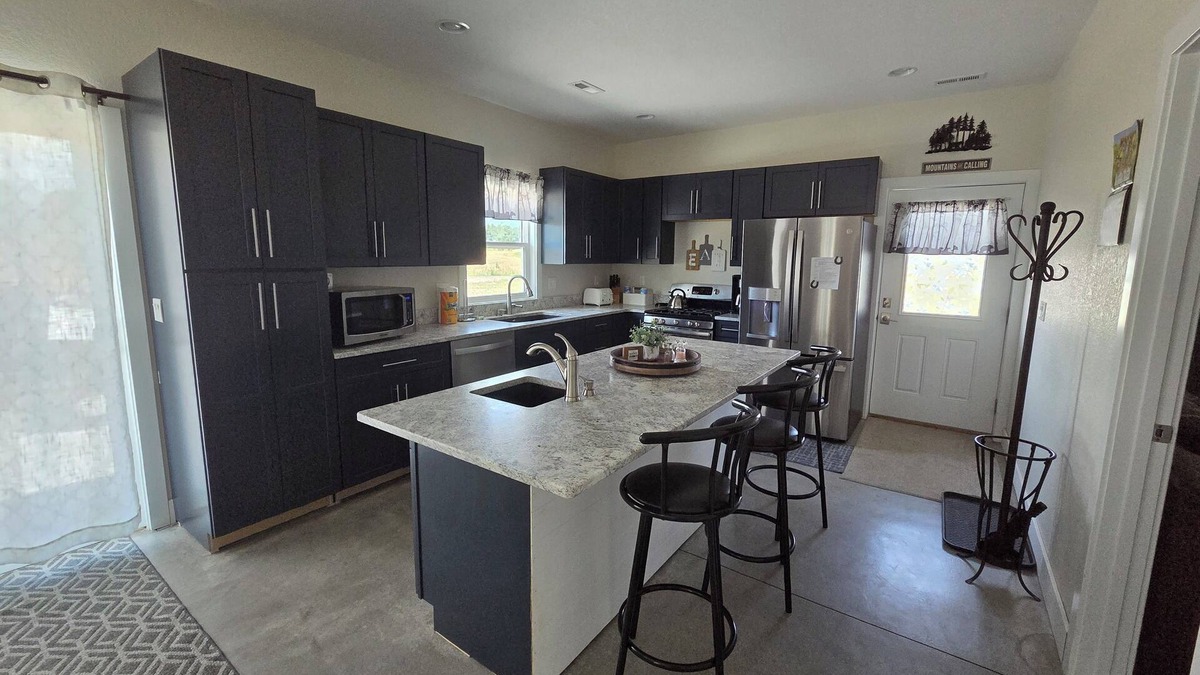 Larkspur House | Country home on scenic, quiet acreage near Monument. Convenient to interstate.