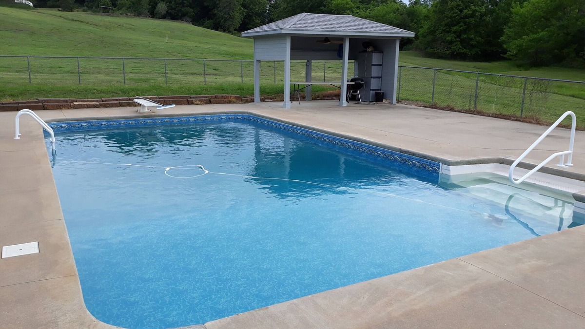 Checotah House | Country lake retreat with Pool and Boat Dock!nCozy + food/attractions nearby!