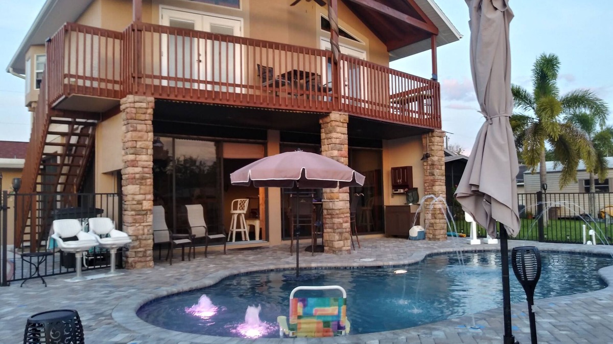 Fort Myers Shores House | Couples Retreat upstairs suite off the Caloosahtchee River with private pool