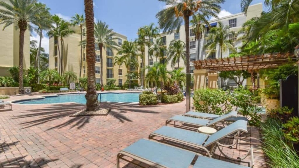 Downtown West Palm Beach Condo | Courtyard Oasis - Drift into Downtown Comfort with Pool Access