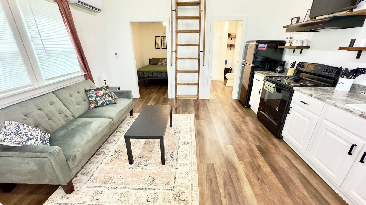 Albertville House | Coyote Tiny Luxury Cabin on Lake with Arcade
