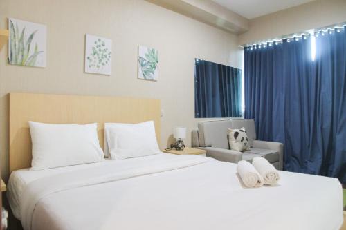 Bekasi Barat Apartment | Cozy 1BR Apartment Grand Kamala Lagoon By Travelio