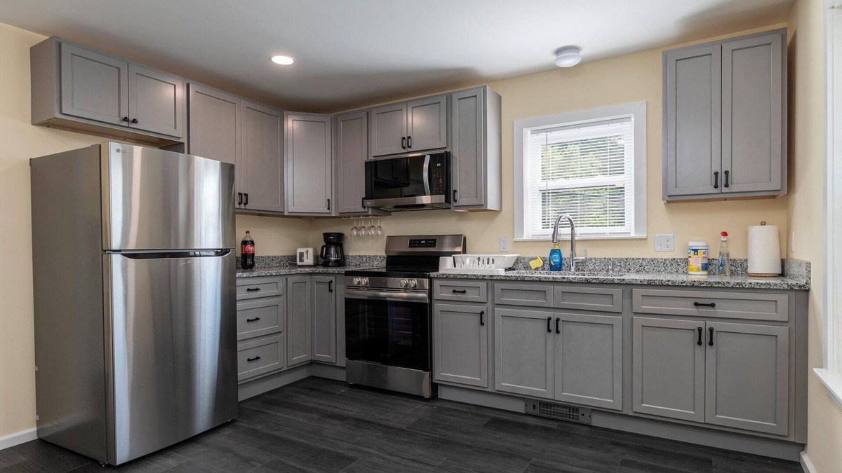 Guild Apartment | Cozy 2-bedroom apt 4 innLakes Region with AC, WiFi, Pet friendly 2 queen beds
