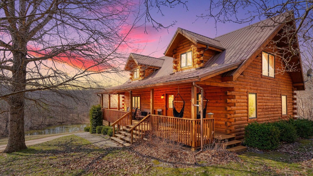 Creola Cabin | Cozy 2-bedroom cabin. Private and wooded setting, WiFi, Pond & Hot Tub