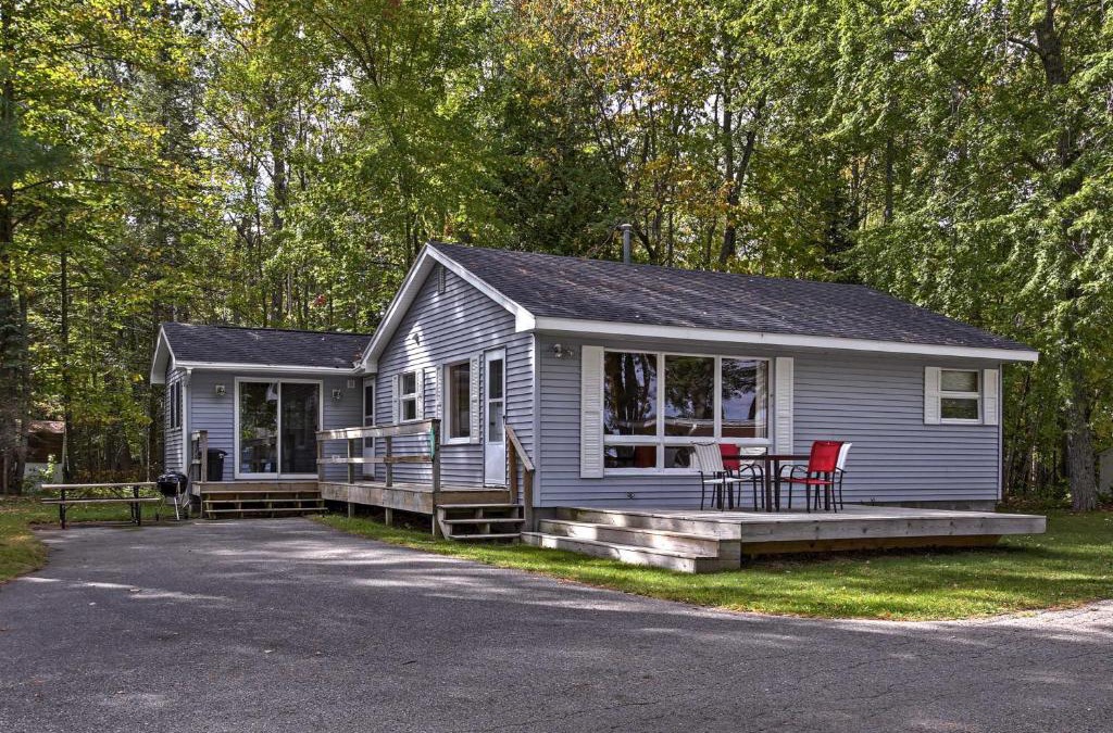 Burt Lake House | Cozy Alanson Cottage - Steps to Dock on Burt Lake!