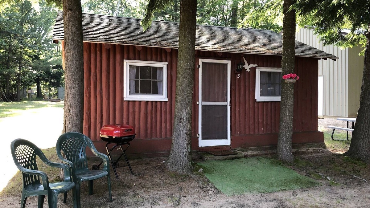 Pentwater Cabin | Cozy "Beach" Cabin in the woods with Pentwater Lake frontage and access