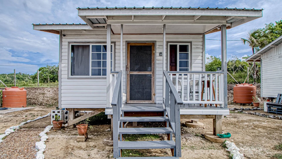 Georgeville Cabin | Cozy cabana with shared plunge pool, scenic views, kitchenette, AC, & WiFi