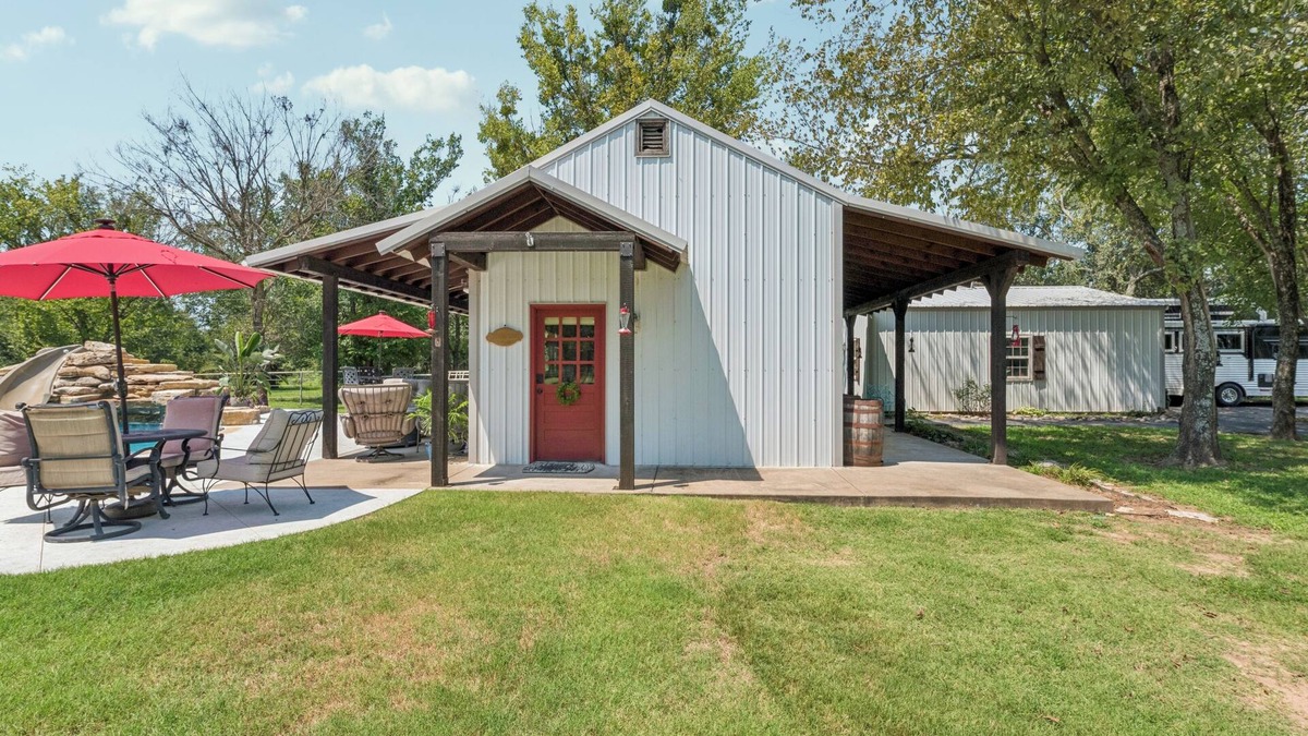 Okmulgee County Cabin | Cozy Cabin in the Country with resort style pool! Secluded, Slide and Waterfall