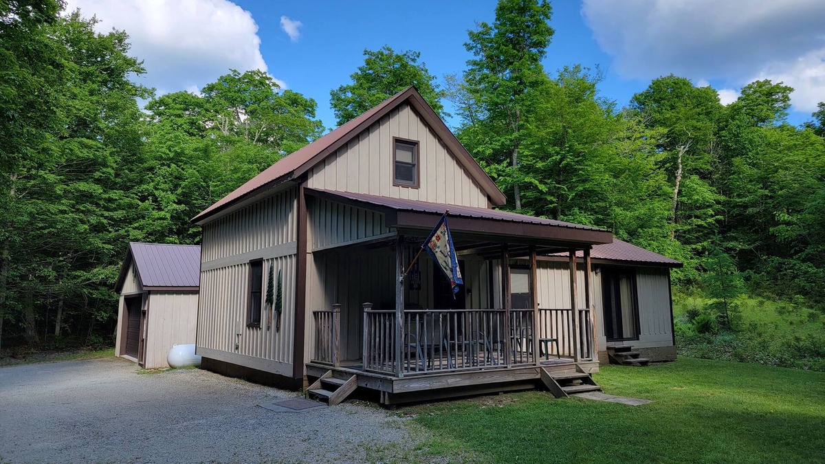 Inlet Cabin | COZY CABIN NEAR A CREEK IN THE FOREST