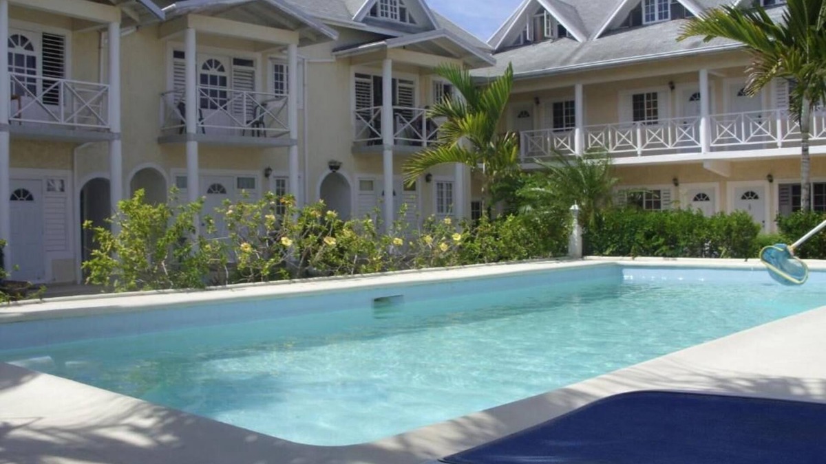 Stewart Town Apartment | Cozy Caribbean Paradise Getaway with Pool. Come for the Sea, Sand and Sun