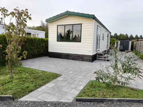 Berkhout Ski Chalet | Cozy chalet near Amsterdam at Camping Venhop