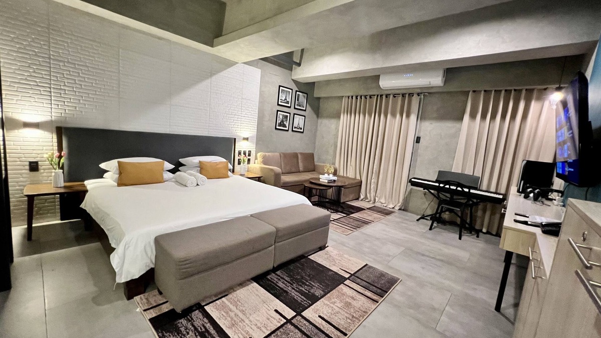 Kaunlaran Condo | Cozy, Comfy & Spacious Hotel Type Condo with FREE Wifi, PS5 & 55" Smart TV