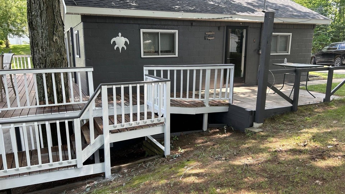 Curtis Township Cottage | Cozy cottage in Glennie MI on all sports North Lake with deck, dock & firepit.