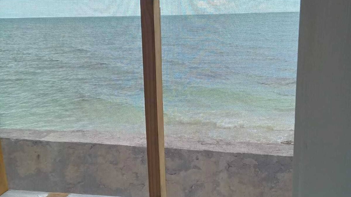 Andros Town House | Cozy cottage with AC, Washer & dryer, spacious, situated on the beach.
