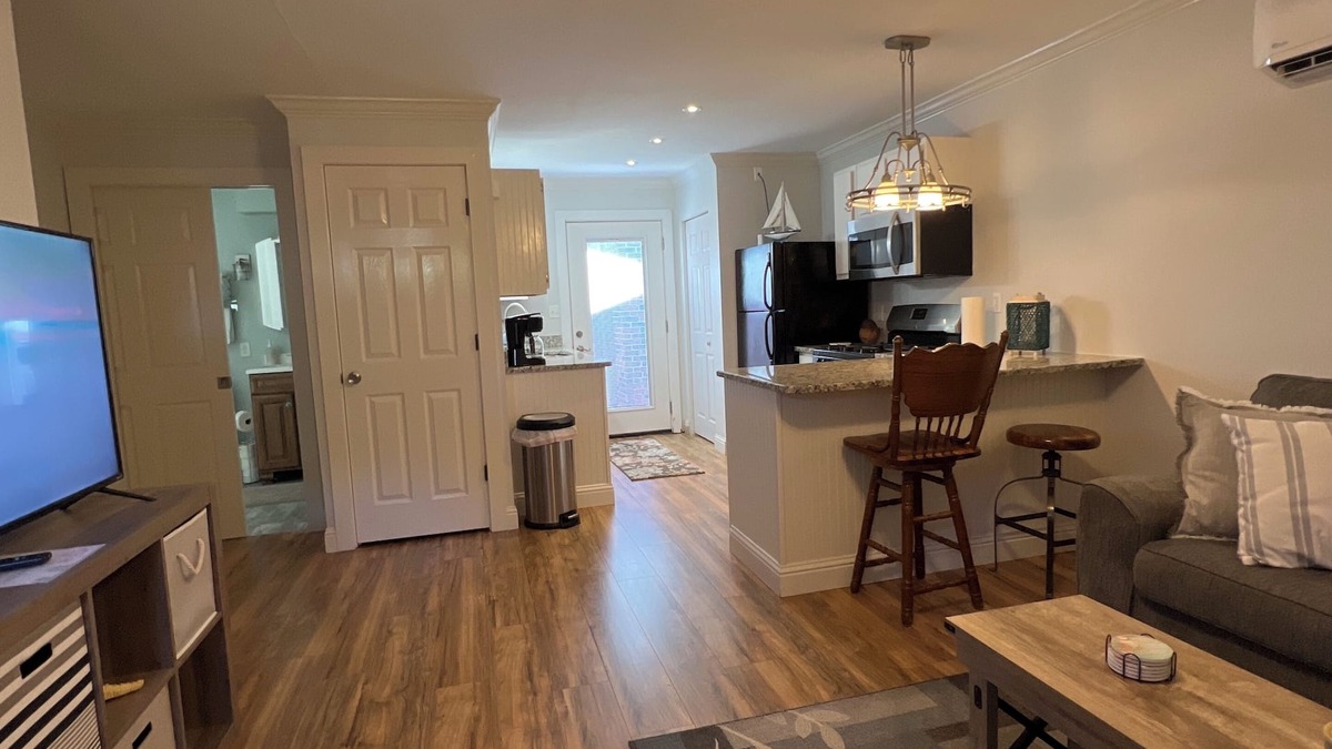 Navarre House | Cozy cottage with private shaded patio and grilling area. Perfect Retreat!