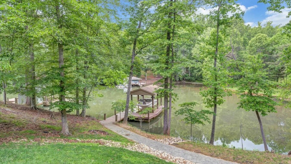 Moneta House | Cozy Cove- Fenced yard for your dog and calm waters to swim for the family