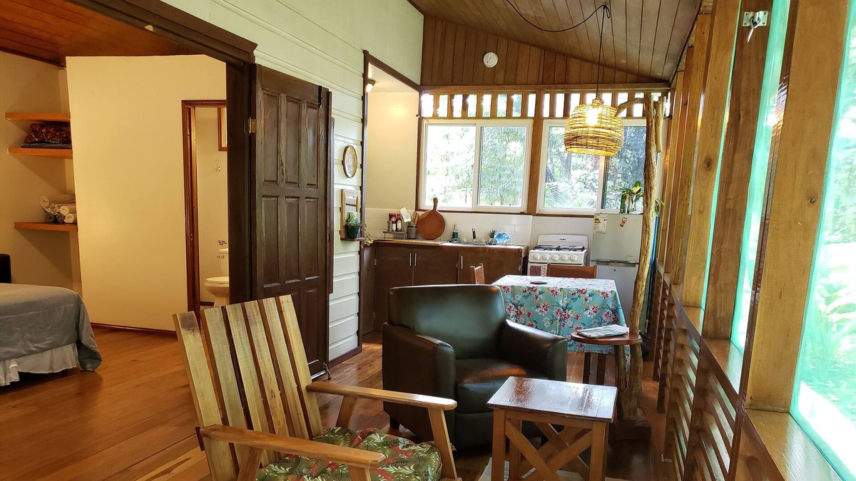 San Ignacio Cabin | Cozy Forest Screened Cabin- 2 beds, AC, firepit patio -7 min to downtown