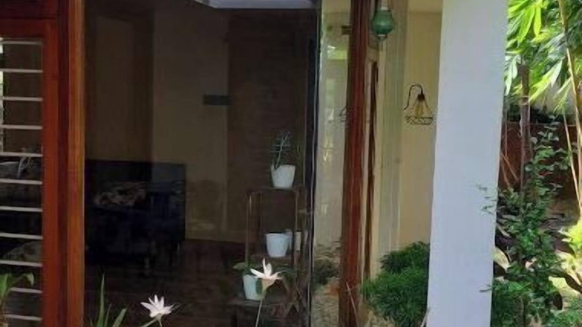 Varkala House | Cozy Glass Villa home. Five minutes walk to the happening Varkala cliff