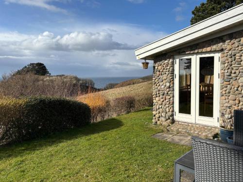 Klint House | Cozy Holiday Home With Sea Views