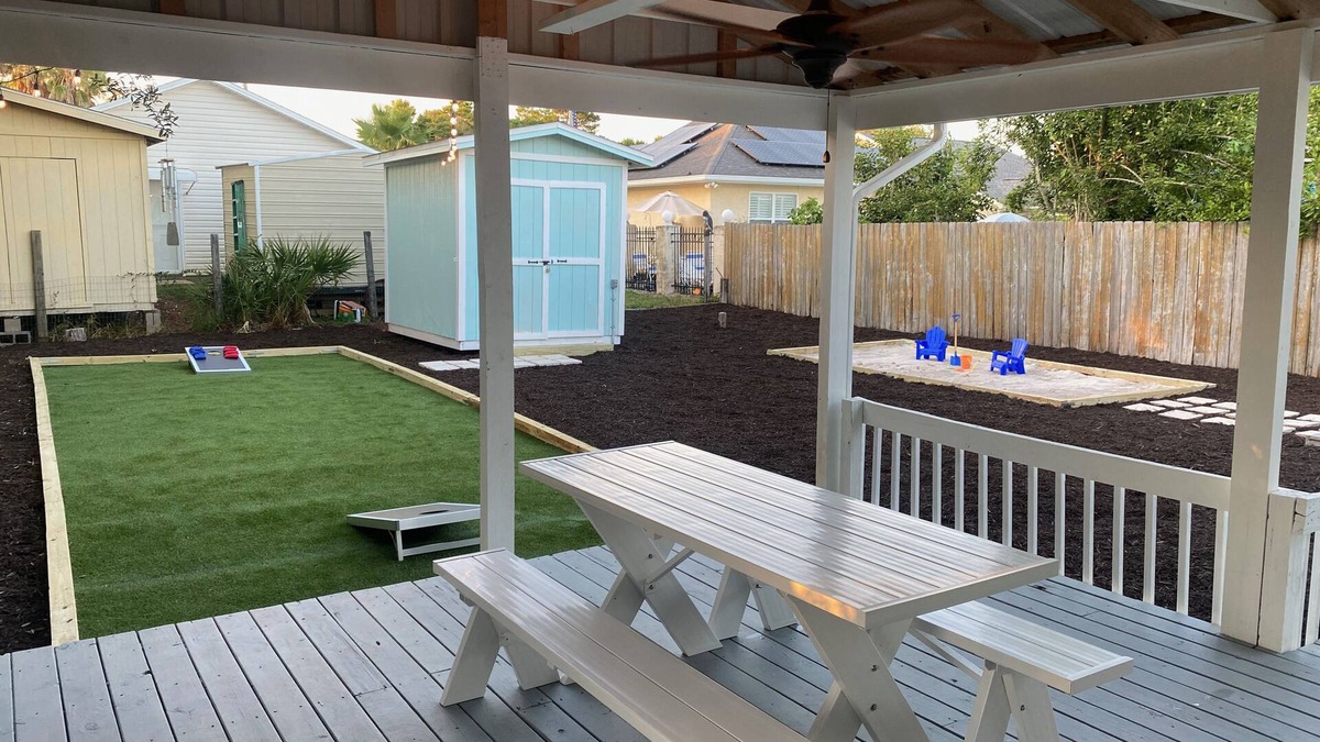 Riviera Beach House | Cozy House, Walk to Beach 🏖️ Large Deck w/Corn Hole & Sandbox 🪣 Pet Friendly🐶
