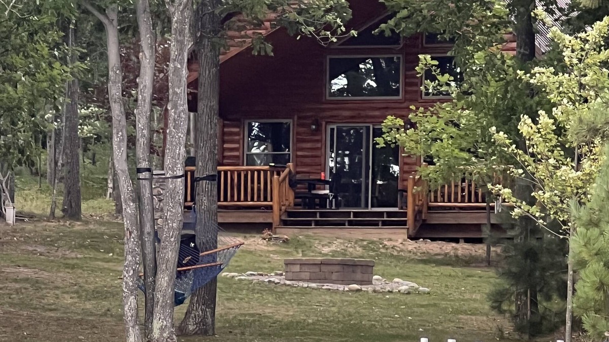 Hillman Cabin | Cozy lake-front home on crystal clear, all sports Long Lake in Hillman, MI.