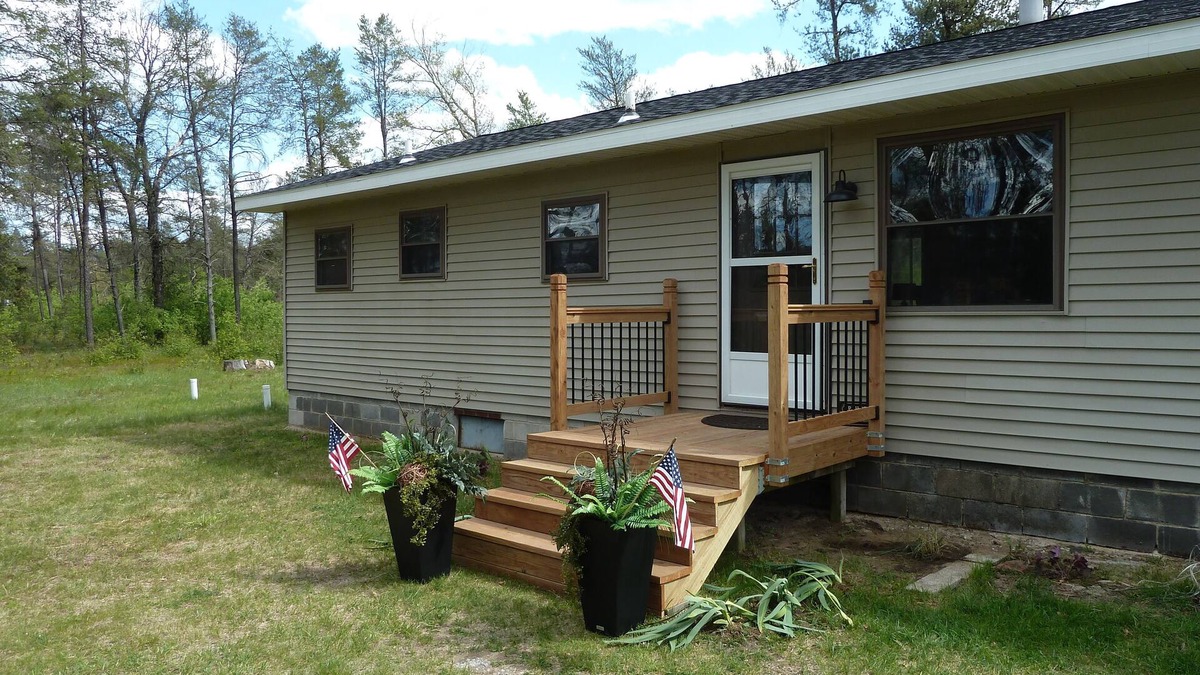 Irons Other | Cozy Lodge on 10 acres- Sleeps 9, Newly Renovated, Game Room, Lg Deck, Irons MI.
