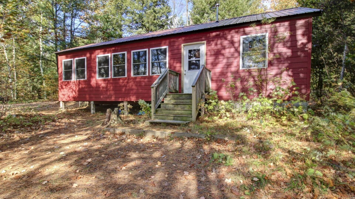 Lac du Flambeau Cabin | Cozy Northwoods, Lake Cabin with private dock. Pet Friendly family cabin