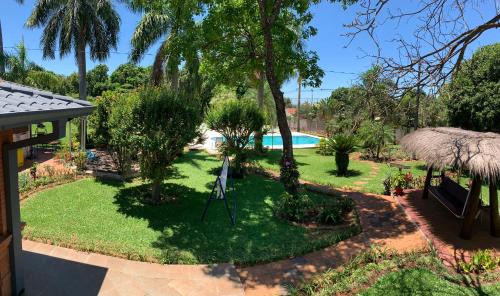 Luque Villa | Cozy & Relaxing Resort Oasis ~ Sports Field ~ Pool