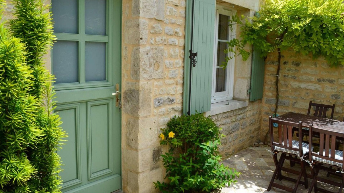 Coulonges Cottage | Cozy Stone House with Private Garden, Bikes, and Baby Equipment