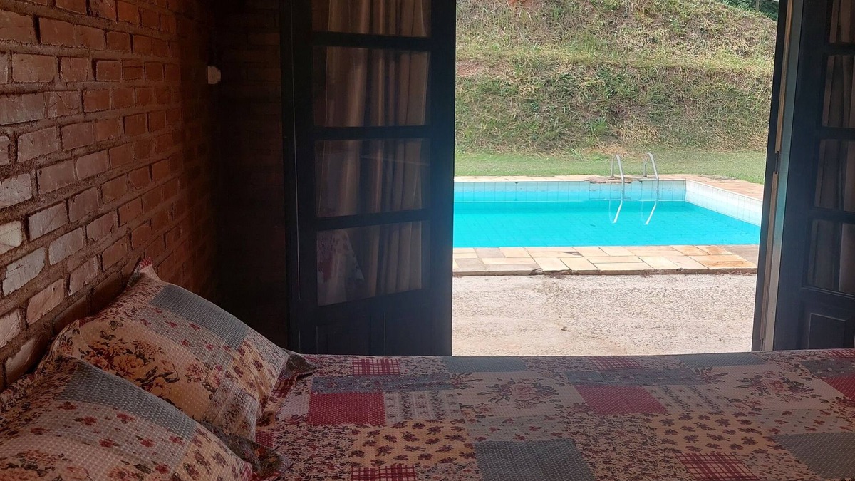 Areal Ski Chalet | Cozy suite with relaxing pool view surrounded by nature