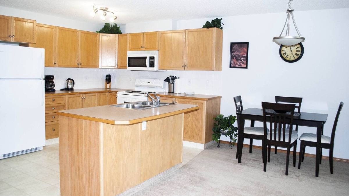 Red Deer Condo | Cozy Two Bedroom Plus a Den in Devonshire on the Park!