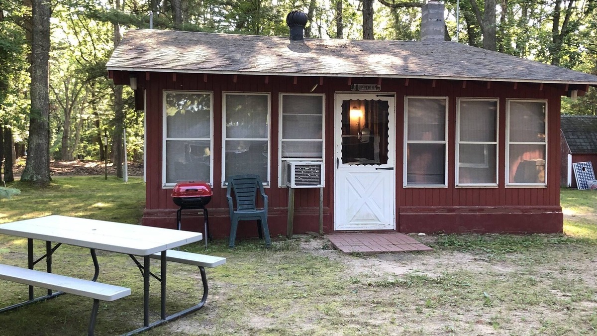 Pentwater Cabin | Cozy "Up North" Cabin in the woods with Pentwater Lake frontage and access
