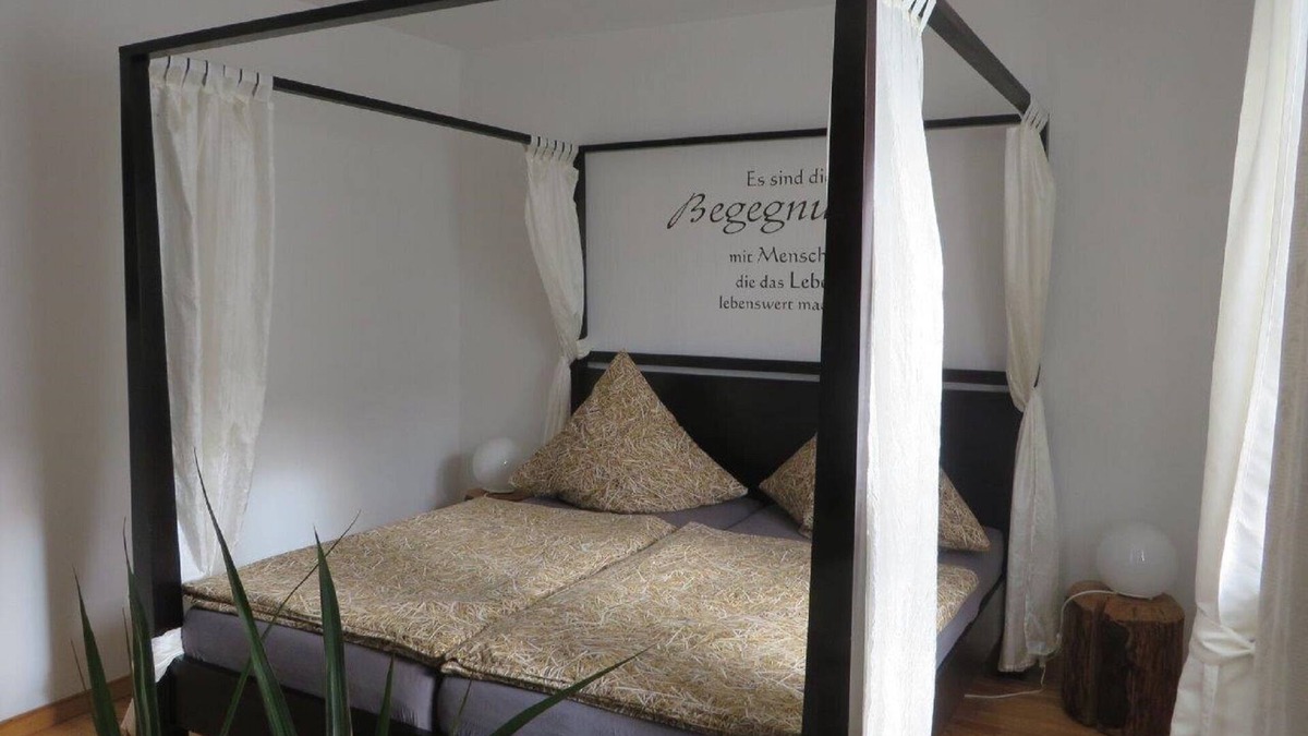 Grossheubach Apartment | Cozy vacation apartment (80 m2) with wooden terrace and sunbathing lawn