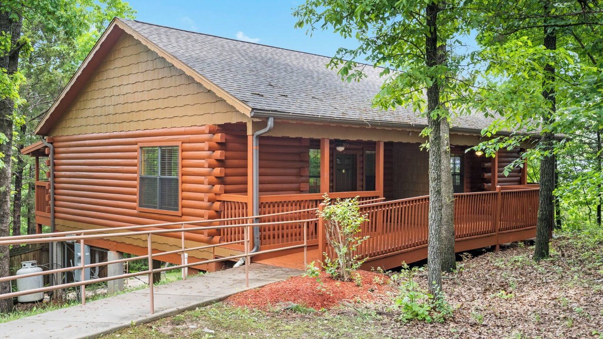 Branson Theater District Cabin | Cozy Walk-in Cabin with Fireplace, Jacuzzi, and Private, Covered Balcony