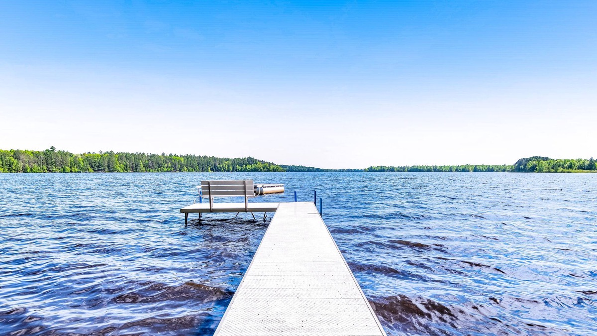 Lac du Flambeau House | Cozy Waterfront Cabin with Deck, Boat Dock, Kayak & Fire Pit