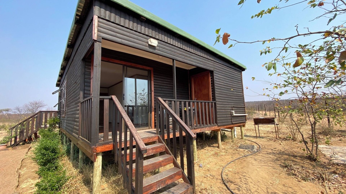 Palapye Cabin | Cozy wooden cabin overlooking the foot of the Tswapong Hills in Palapye.