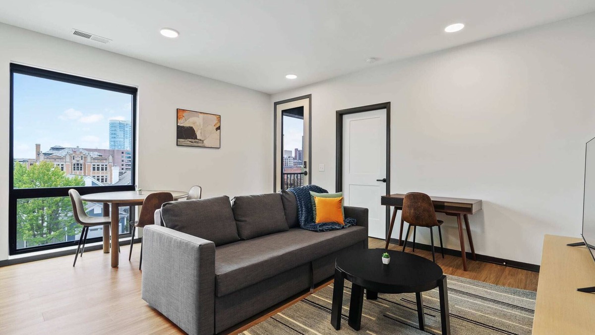 Lockerbie Square Apartment | CozySuites Mass with parking, lounge and roof deck 7