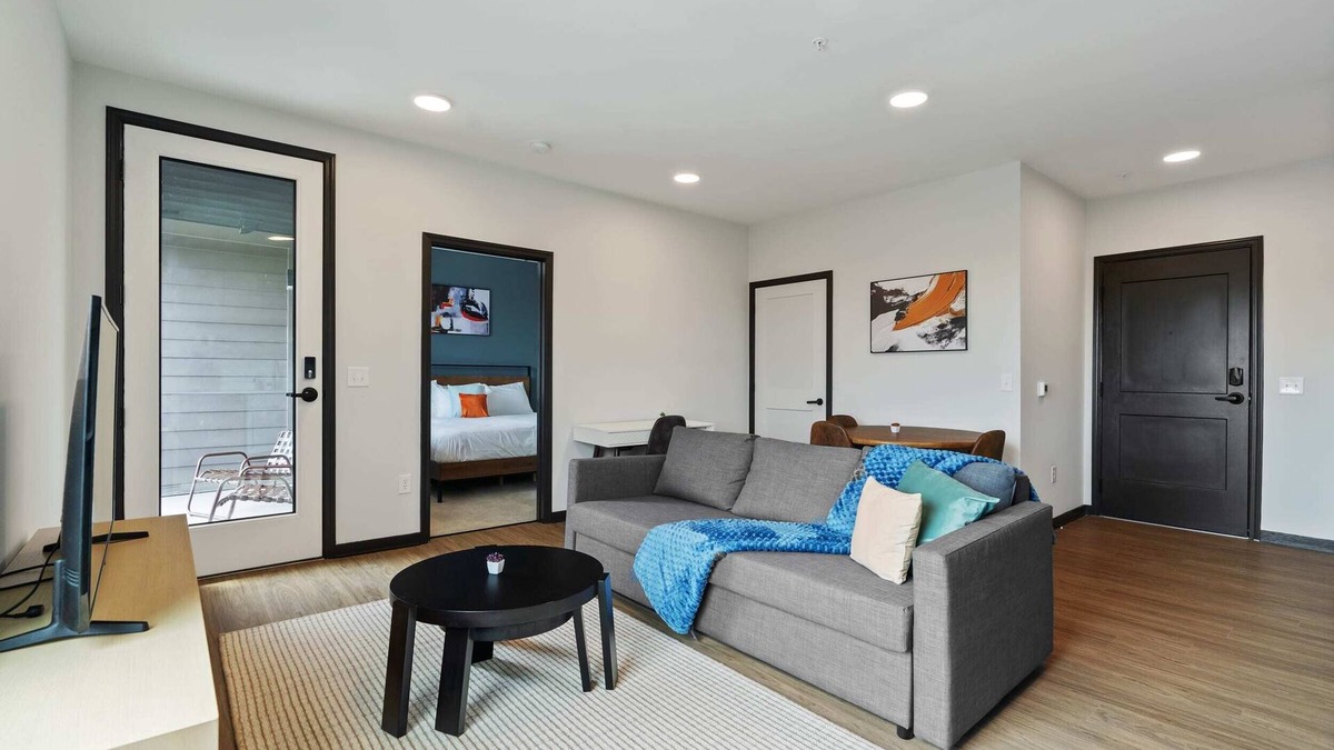 Lockerbie Square Apartment | CozySuites Mass with parking, lounge and roof deck 8