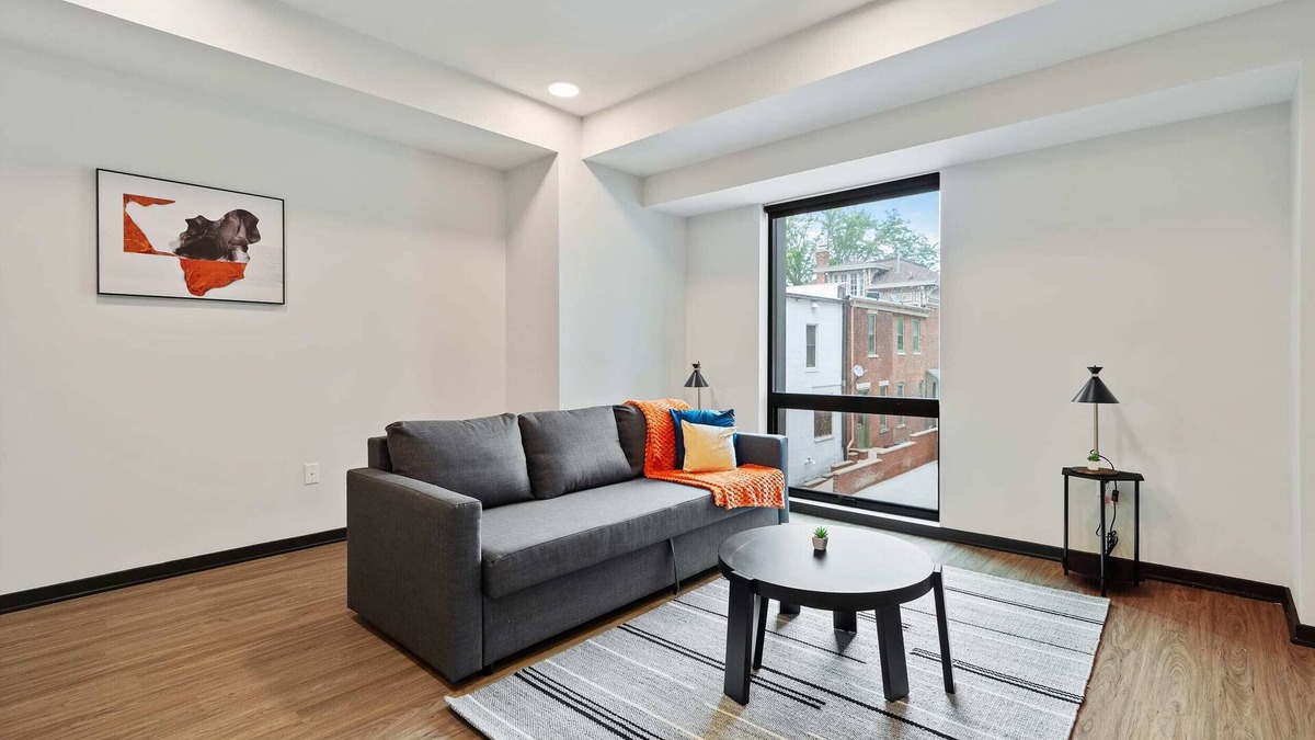 Lockerbie Square Apartment | CozySuites Mass with parking, lounge and roof deck 17