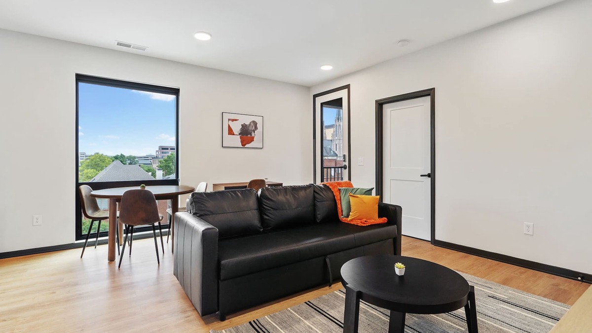 Lockerbie Square Apartment | CozySuites Mass with parking, lounge and roof deck 6