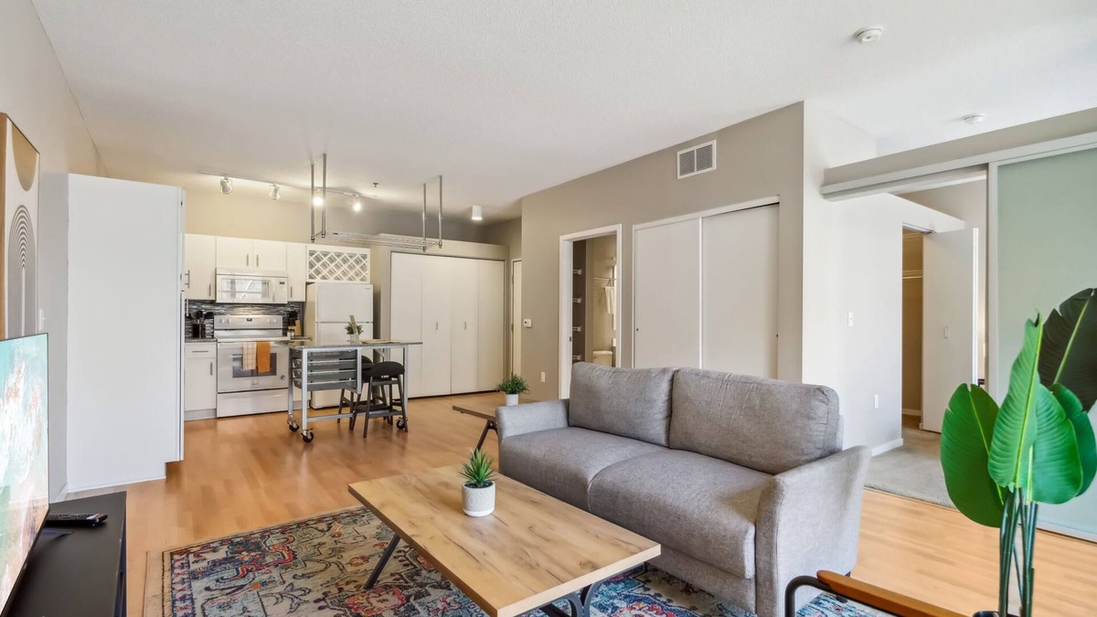 Mill District Apartment | CozySuites Mill District with pool, gym #01