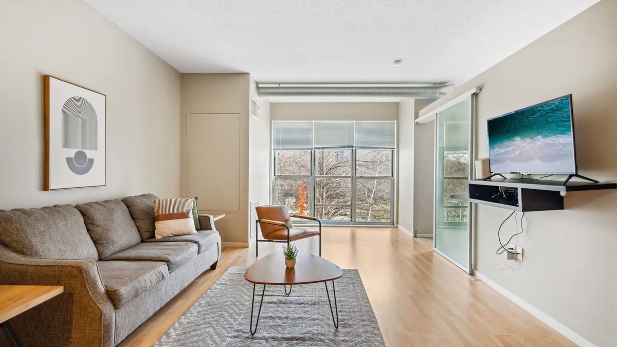 Mill District Apartment | CozySuites Mill District with pool, gym #08