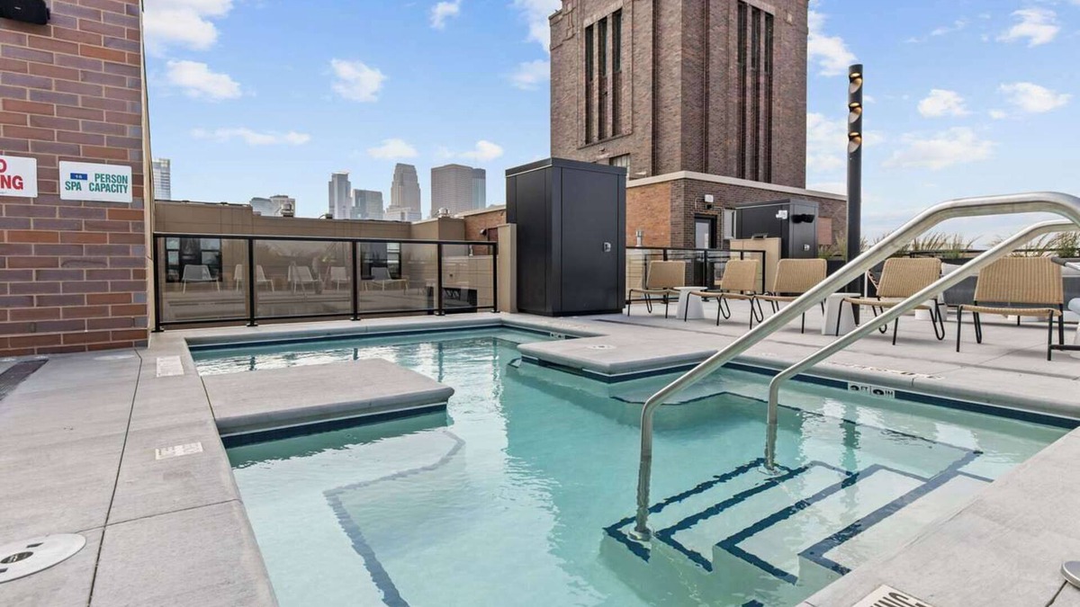 Warehouse District Apartment | CozySuites NLG with pool, bowling alley, sauna 27