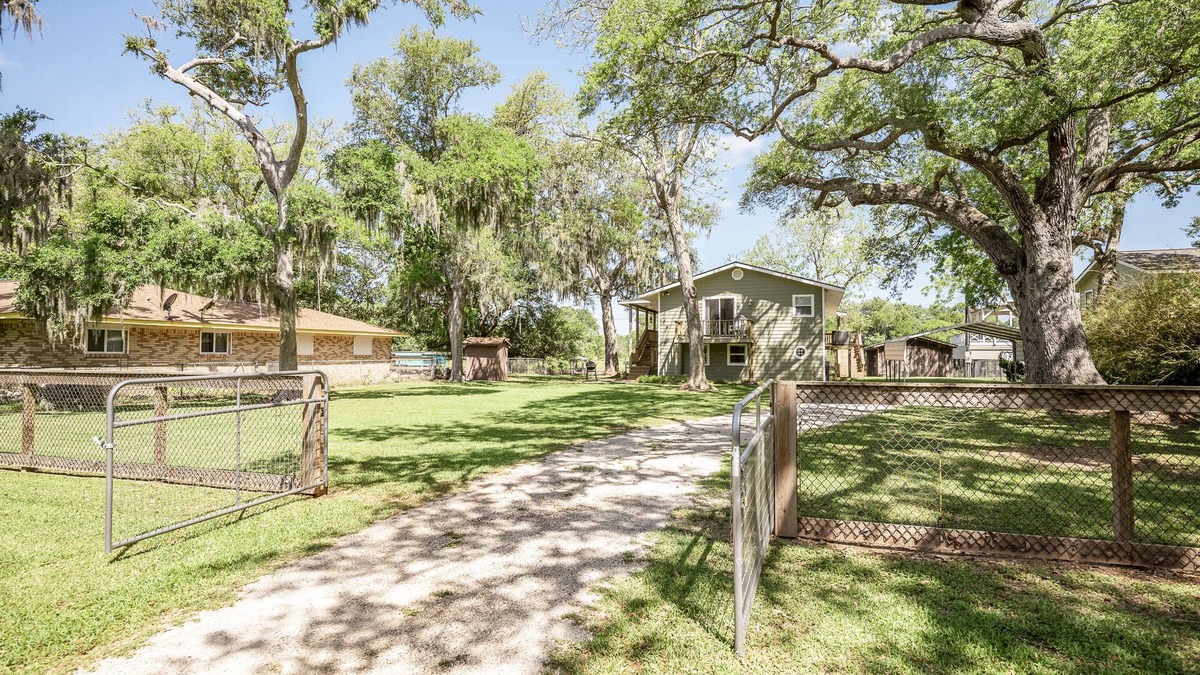 Cedar Lane House | Creek Front Home w/Fishing Pier & Amazing Outdoor Spaces