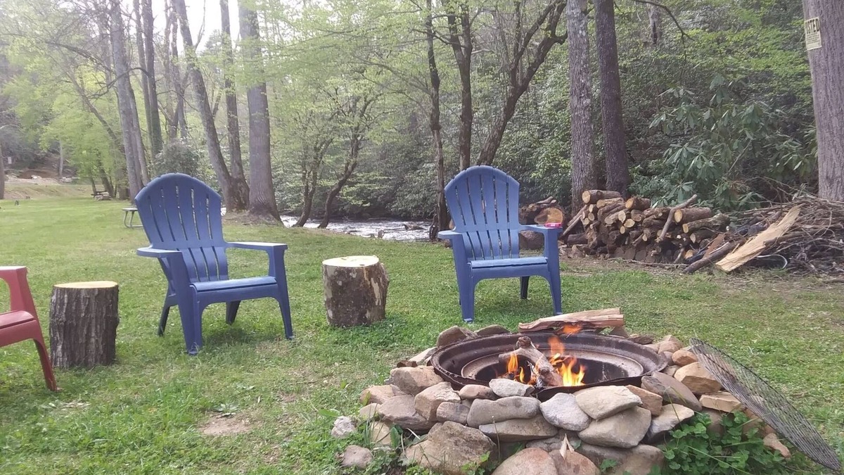 Murphy RV Rental | Creek Front Safari Tent-Furnished, relaxing under the stars, Firepit, Smores.
