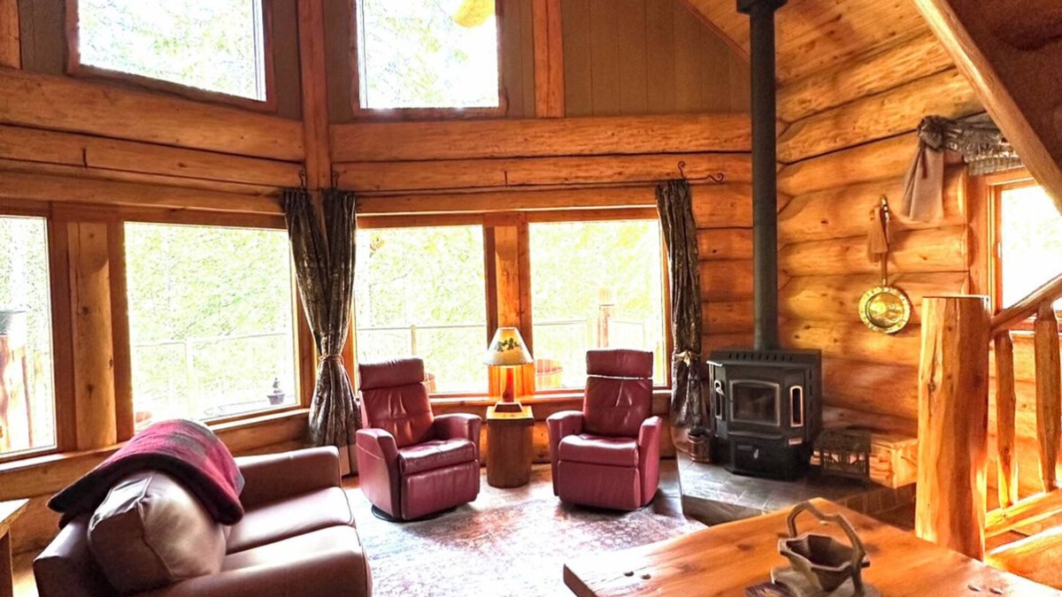 Crawford Bay Cabin | Creek side cabin in the woods with wood stove and deck - pet friendly!